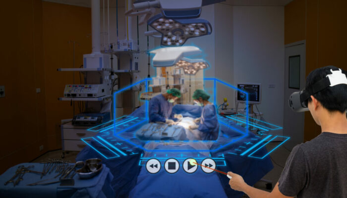 Smart medical technology concept, Medical student use augmented Smart medical technology concept, Medical student use augmented reality technology in operation room for learning the surgery patient , in 3d , it can help to learn various example of surgery