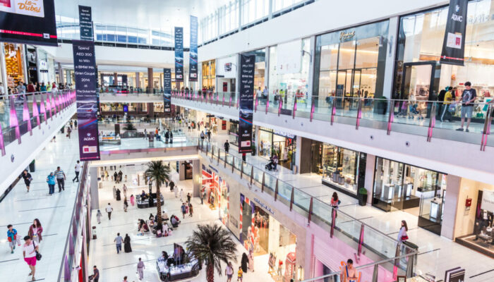 Interior View of Dubai Mall - world's largest shopping mall DUBAI, UAE - NOVEMBER 14: Shoppers at Dubai Mall on Nov 15, 2012 in Dubai. At over 12 million sq ft, it is the world's largest shopping mall based on total area and 6th largest by gross leasable area.
