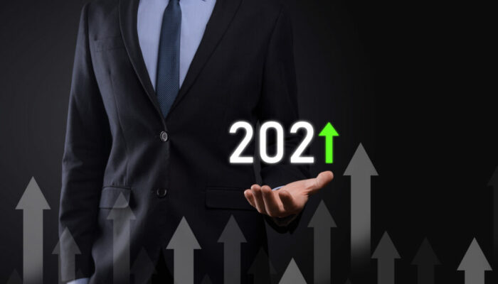 Business development to success and growing growth year 2021 concept.Plan business growth graph in year 2021 concept.Businessman plan and increase of positive indicators in his business.